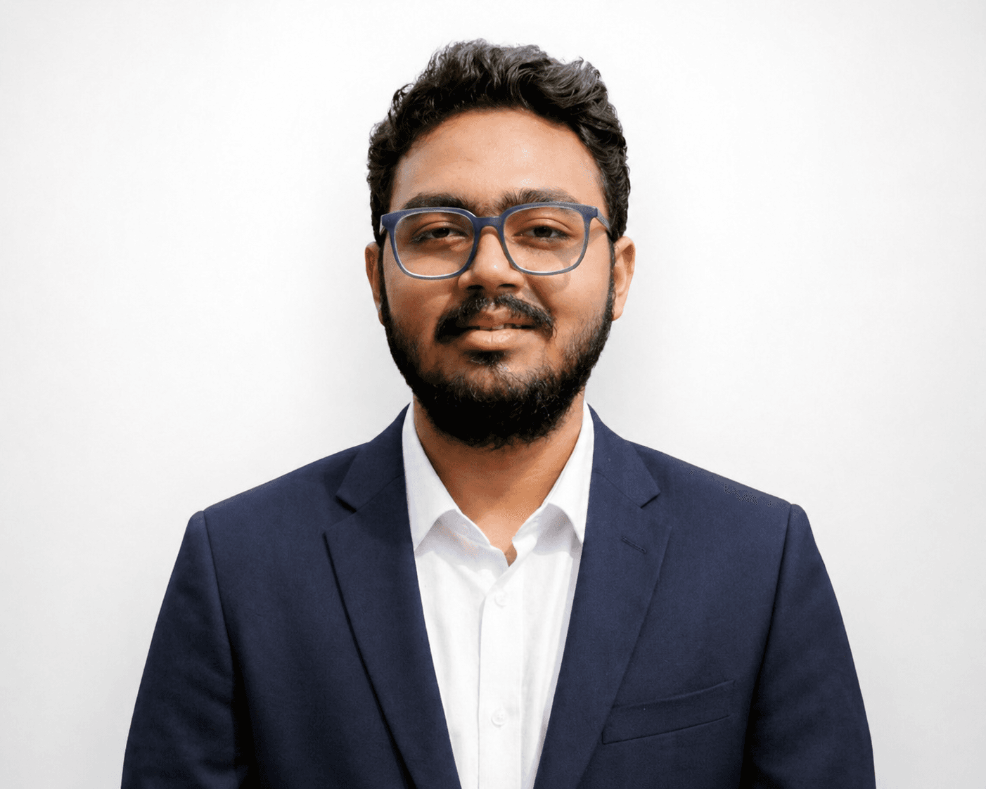 A formal portrait of Bratik Mukherjee, showcasing confidence, professionalism, and the journey of a passionate developer striving to build impactful digital solutions.